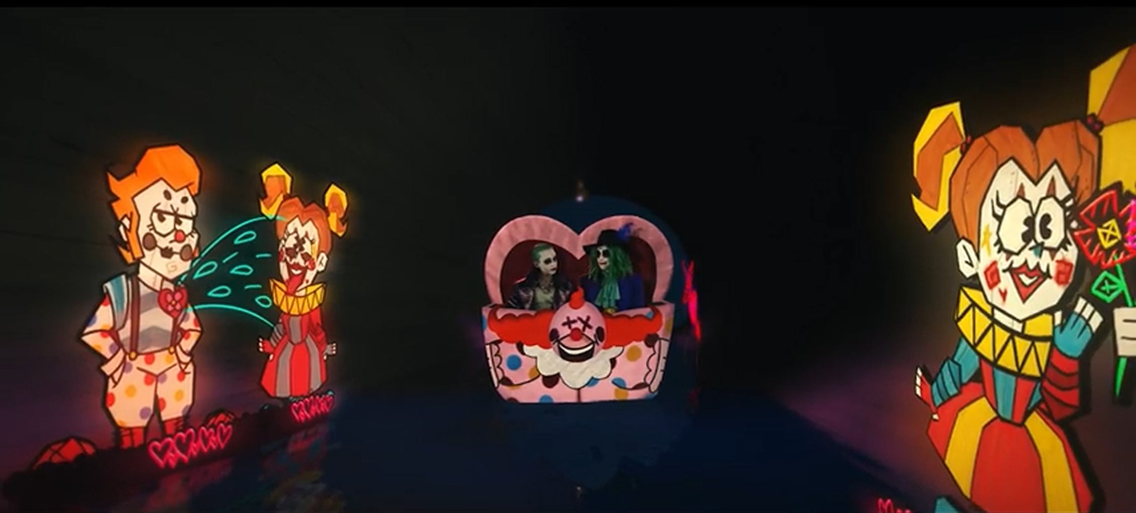 Joker the Harlequin and her boy toy on a love tunnel amusement park ride.